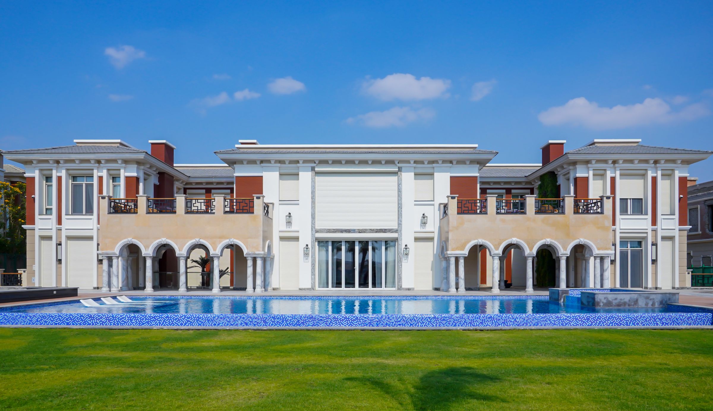 Classical grand estate with a swimming pool and formal gardens